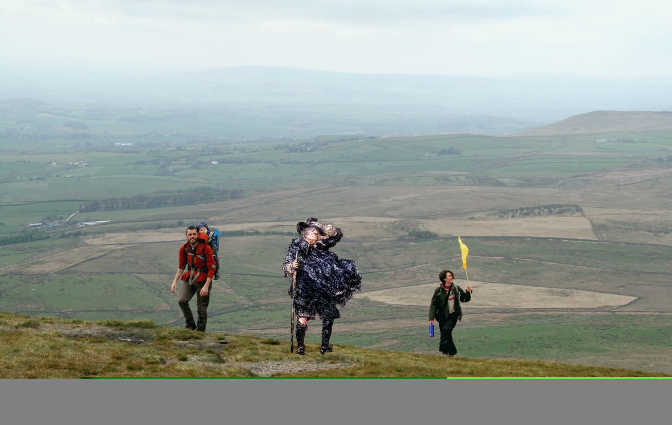 George fox cut out and family walk on Pendle Hill