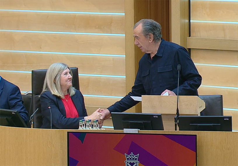 Man and woman shaking hands