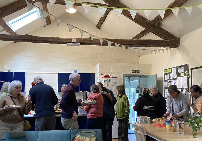 People in a room with bunting