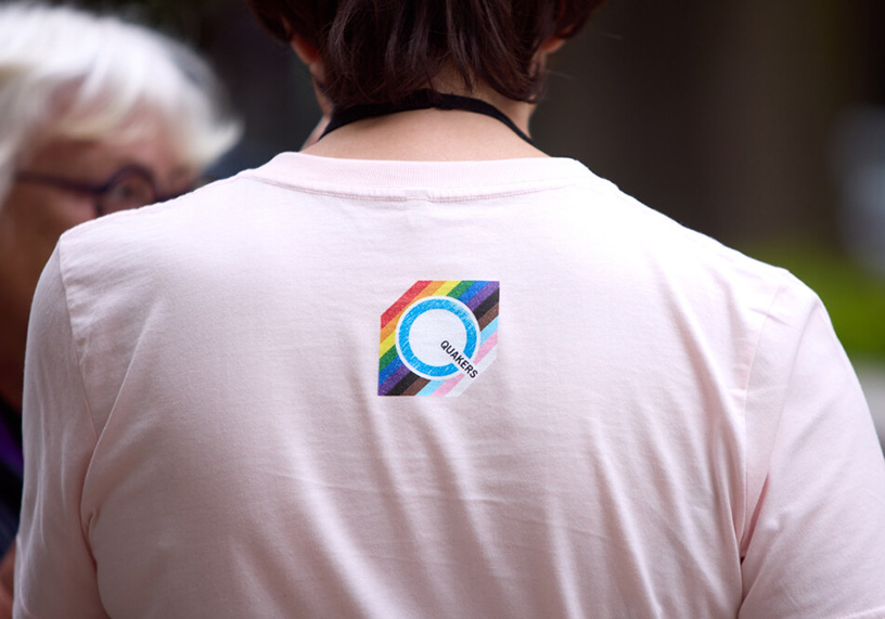 People painting a placard