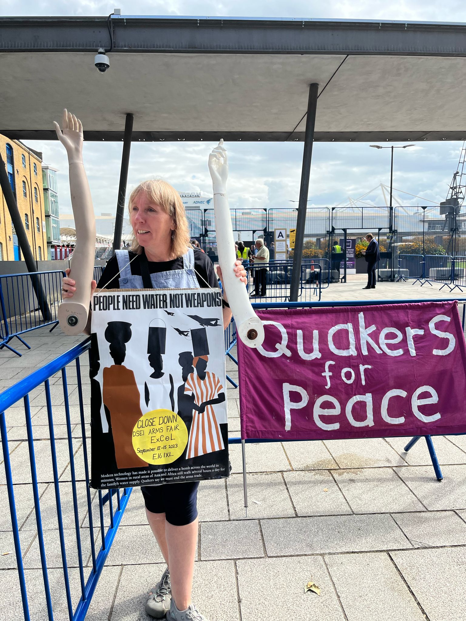 Protester at arms fair