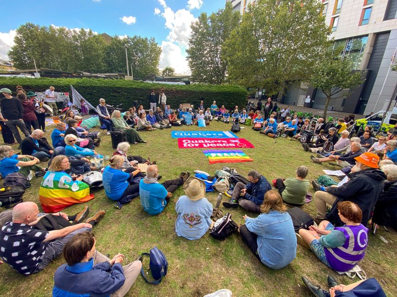 People sitting on grass in circle